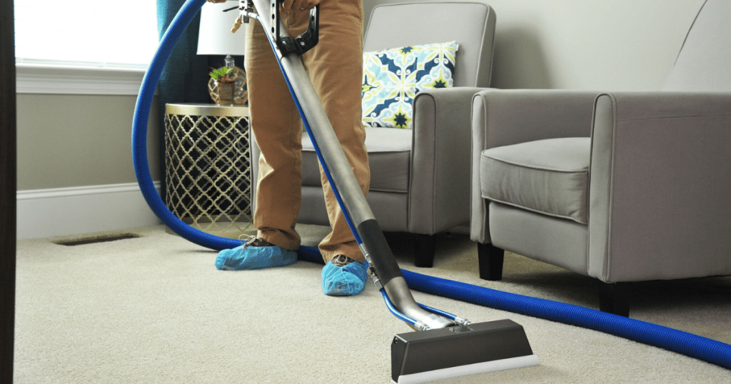 Professional carpet cleaning in a living room.