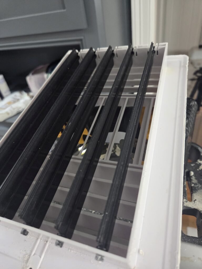 Return air grille removed for inspection in a Willowbend home