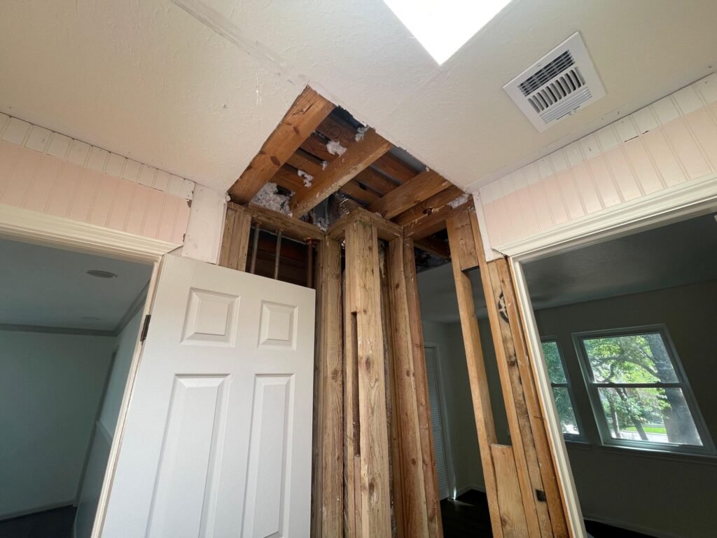 Interior wall opened to the studs during a Houston mold assessment