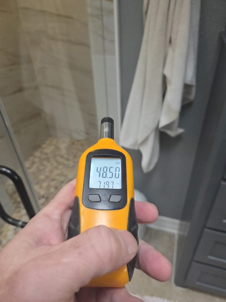 Temperature and humidity reading taken during a Houston mold inspection