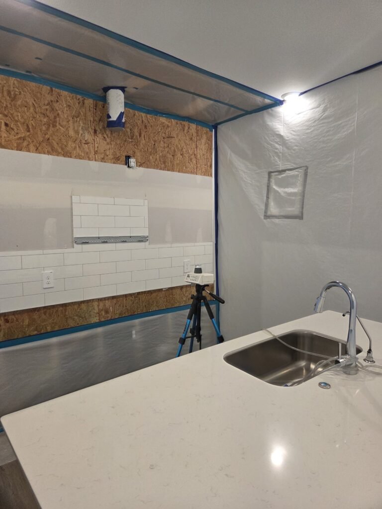 Air sampling pump running inside containment during post-remediation clearance testing
