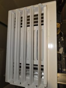 Supply register removed for inspection in a Spring home
