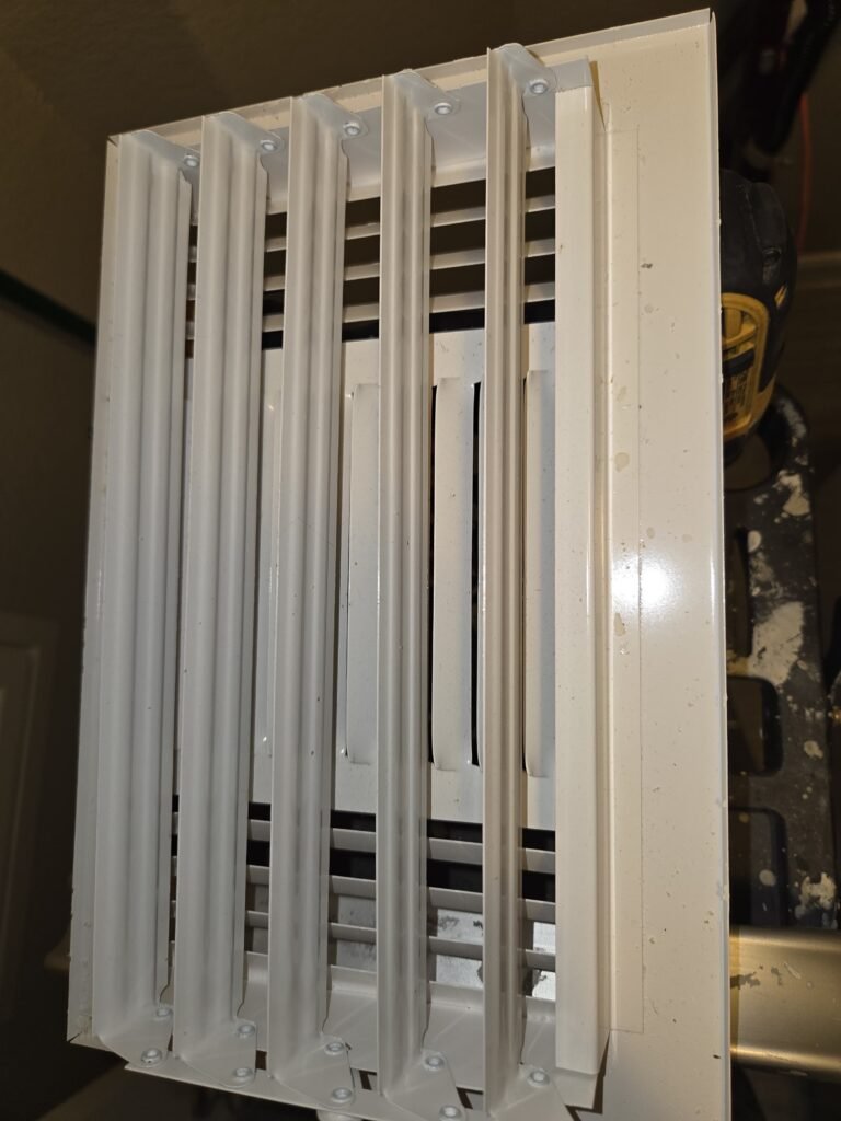 Supply register removed for inspection in a Spring home