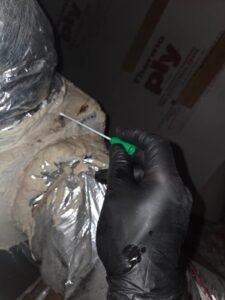 Swab sample taken at an attic duct connection during a mold inspection in a Pearland home