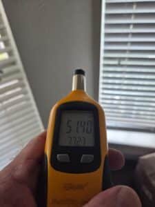 Hygrometer showing 51.4 percent indoor relative humidity during a Pearland home mold inspection